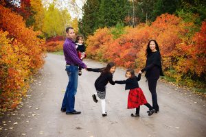 Fall photography of a young family at the University of Guelph's Arboretum.