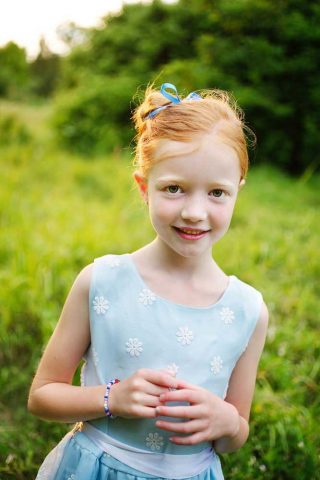 Redhead girl at the Arboretum Centre, photographed by portrait artist Trina Koster.