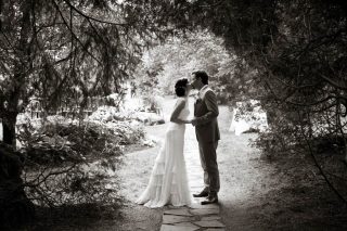 Couple kissing under trees at the Millcroft Inn, Alton